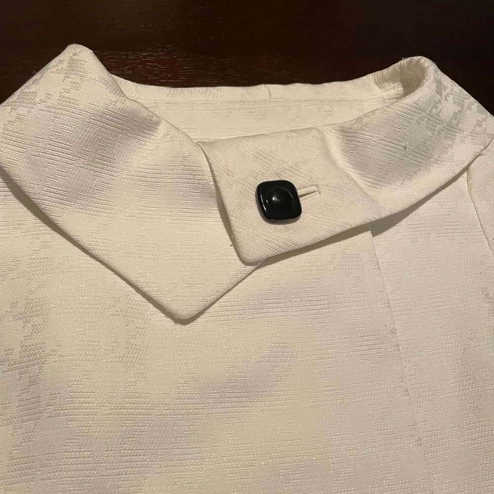 Don’t have a top to go with those pants? Tahari covers that.
